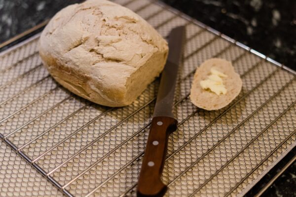 bread on white and black checkered textile