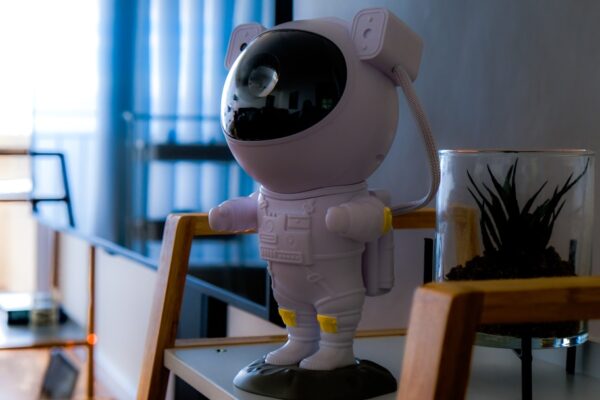 a small robot standing on top of a table