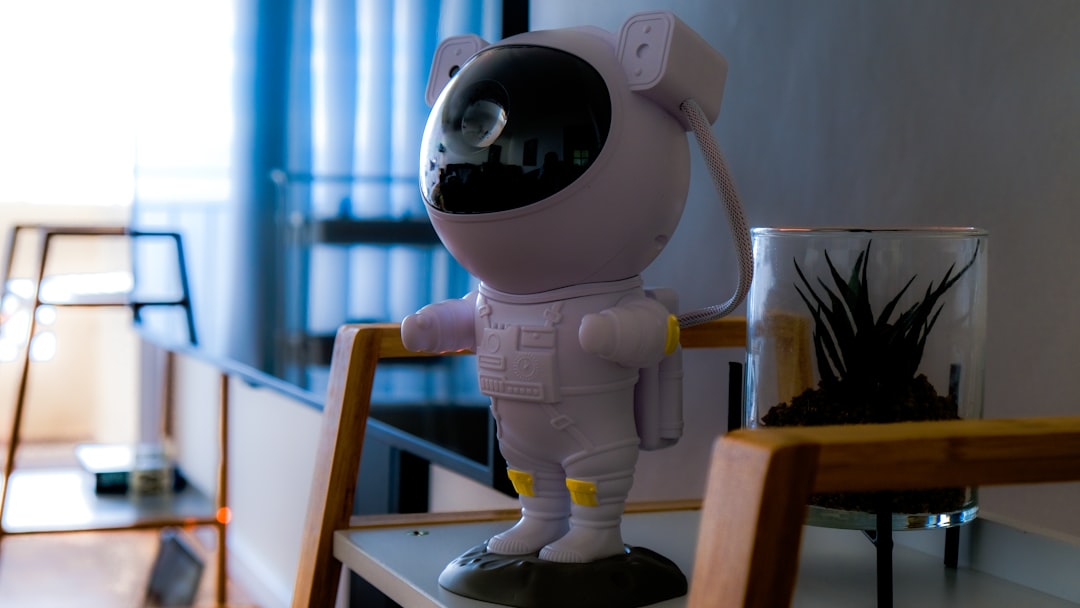 a small robot standing on top of a table
