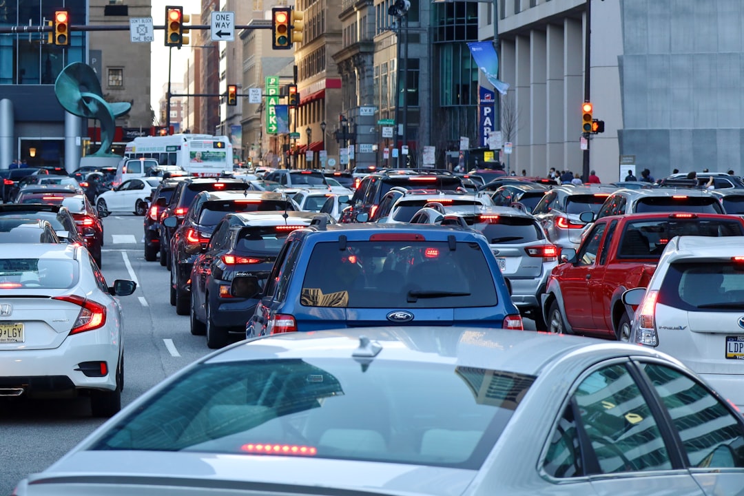 a busy city street filled with lots of traffic