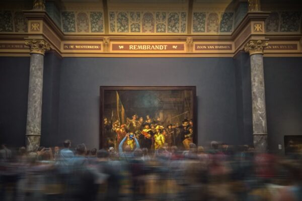 selective focus photography of group of people painting