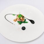 green vegetable on white ceramic plate